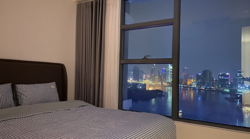 The bedroom offers a view of the city center