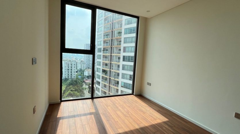 Spacious bedroom with large window