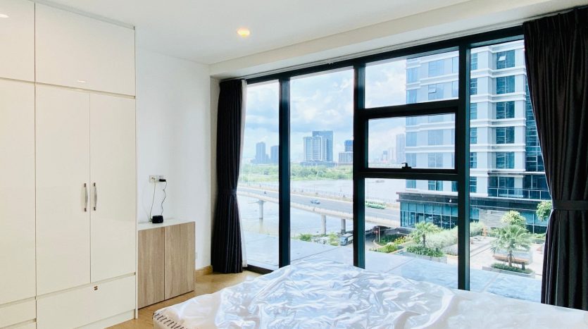 spacious bedroom with river view