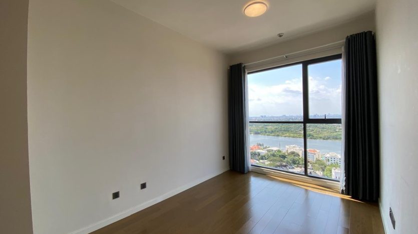 large bedroom with river view