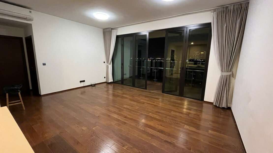 Living room with folding glass doors to the balcony, D'edge Thao Dien 3-bedroom