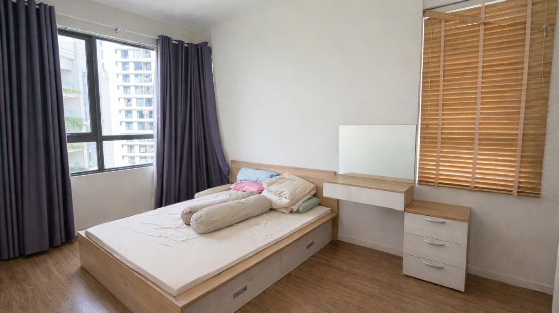 Bedroom with windows on two walls and storage bed, Masteri An Phu 2BR for rent