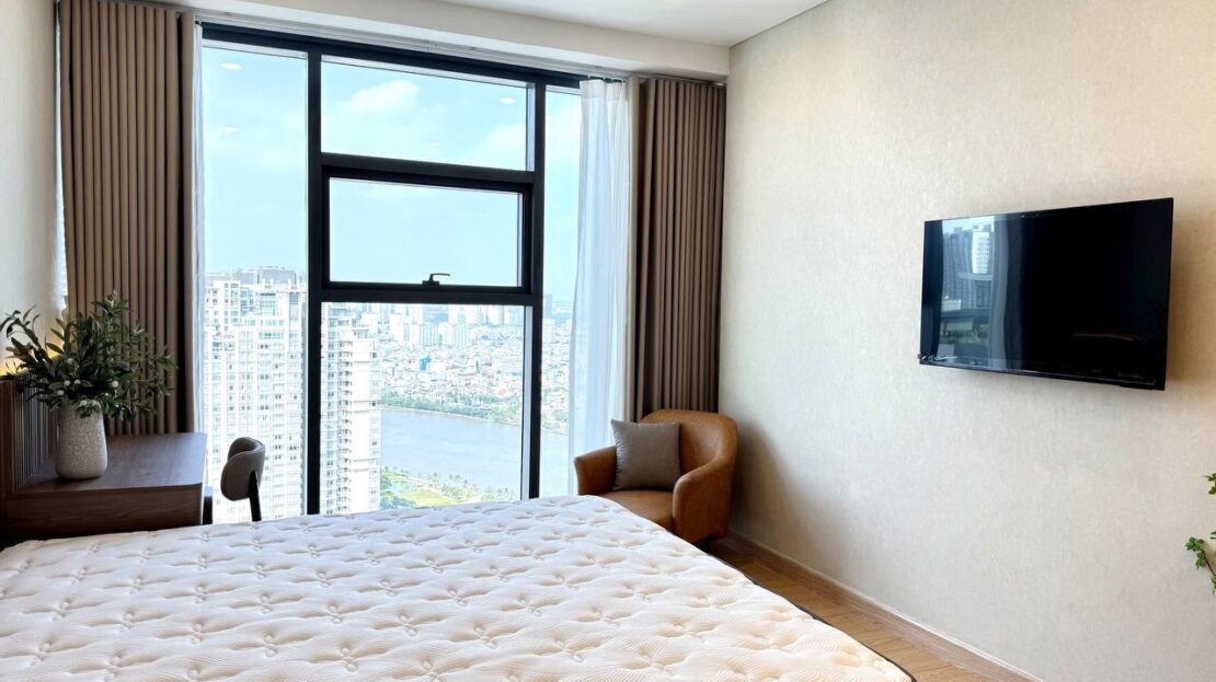 Bedroom with river view, desk and leather armchair, newly furnished Sunwah Pearl 2BR
