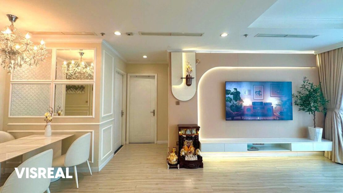 Dining area with crystal chandelier and backlit TV wall, 3-bedroom apartment in Vinhomes Central Park