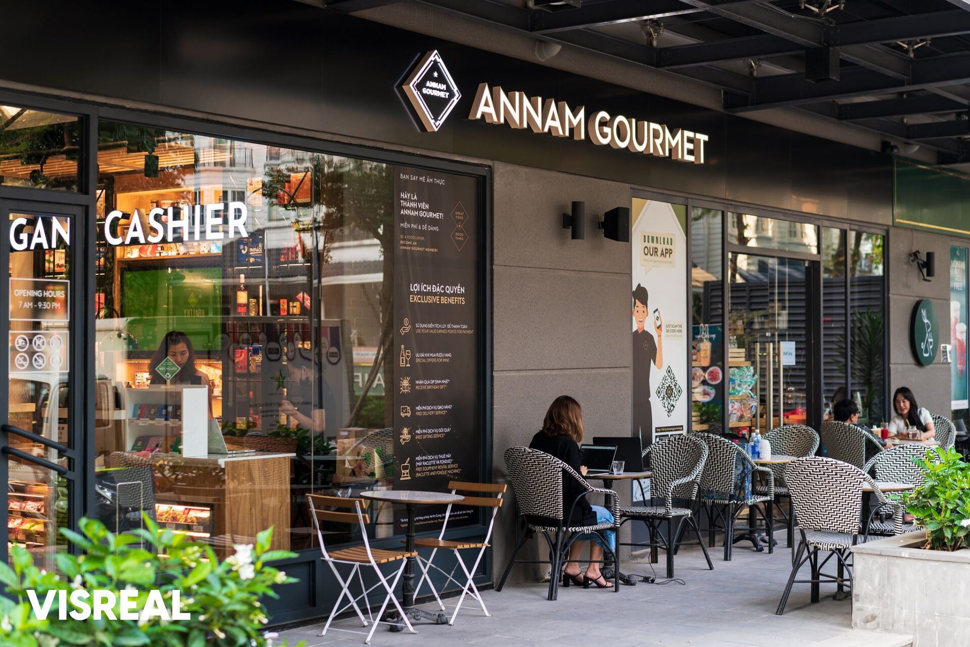 Annam Gourmet storefront with outdoor seating in Ho Chi Minh City