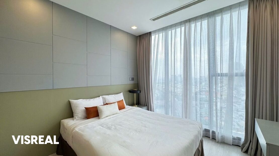 Bedroom with panelled green-grey wall and full-height curtains, Vinhomes Golden River 3BR