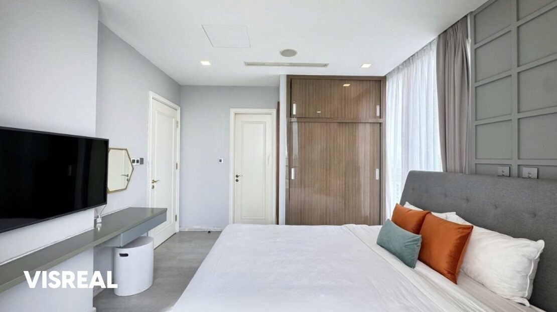Master bedroom with sliding wardrobe and TV desk, Vinhomes Golden River apartment