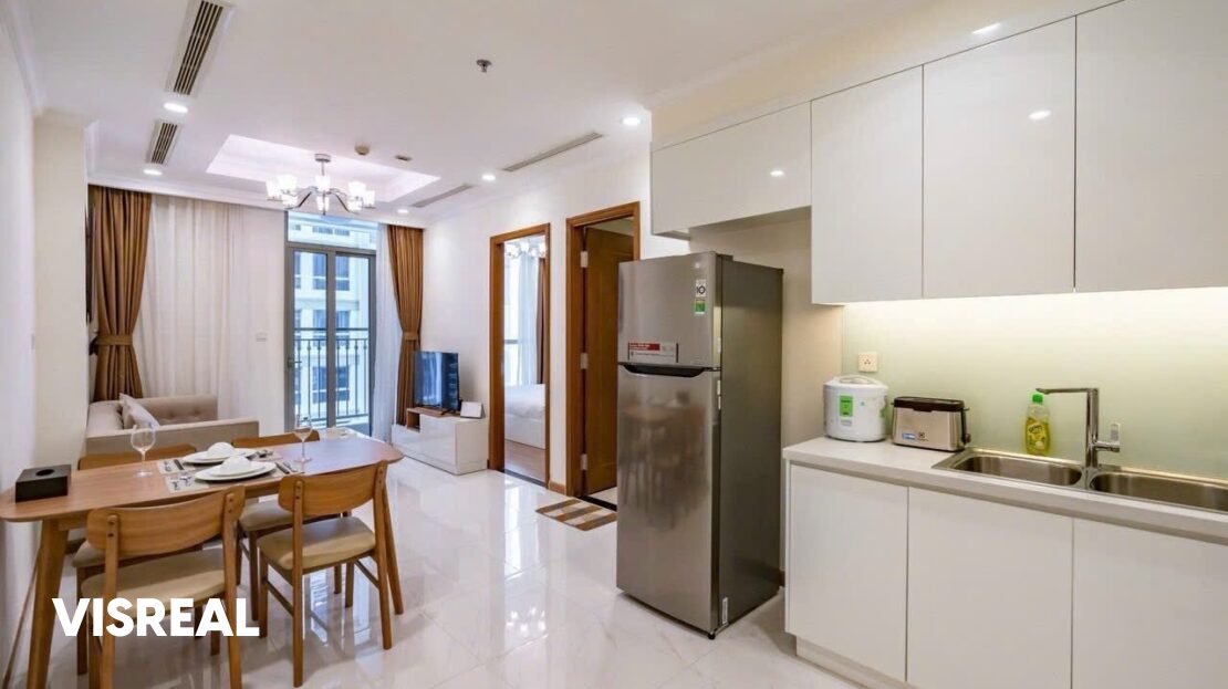 Open kitchen with LG fridge next to the dining area, 1BR apartment in Vinhomes Central Park