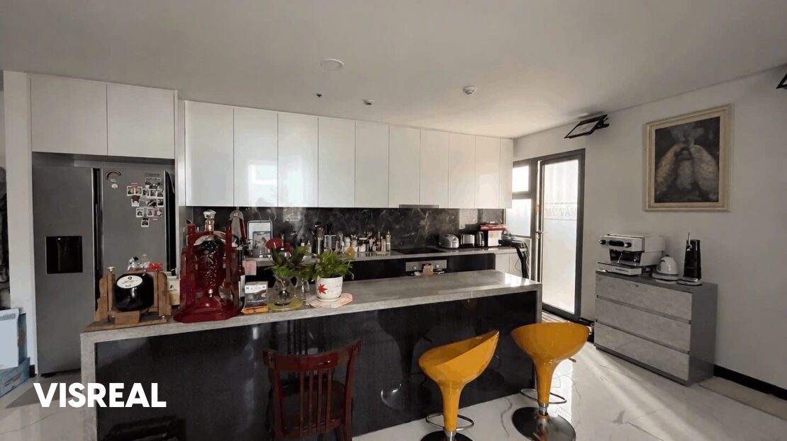 Kitchen island with bar stools and side-by-side fridge, Empire City 3-bedroom
