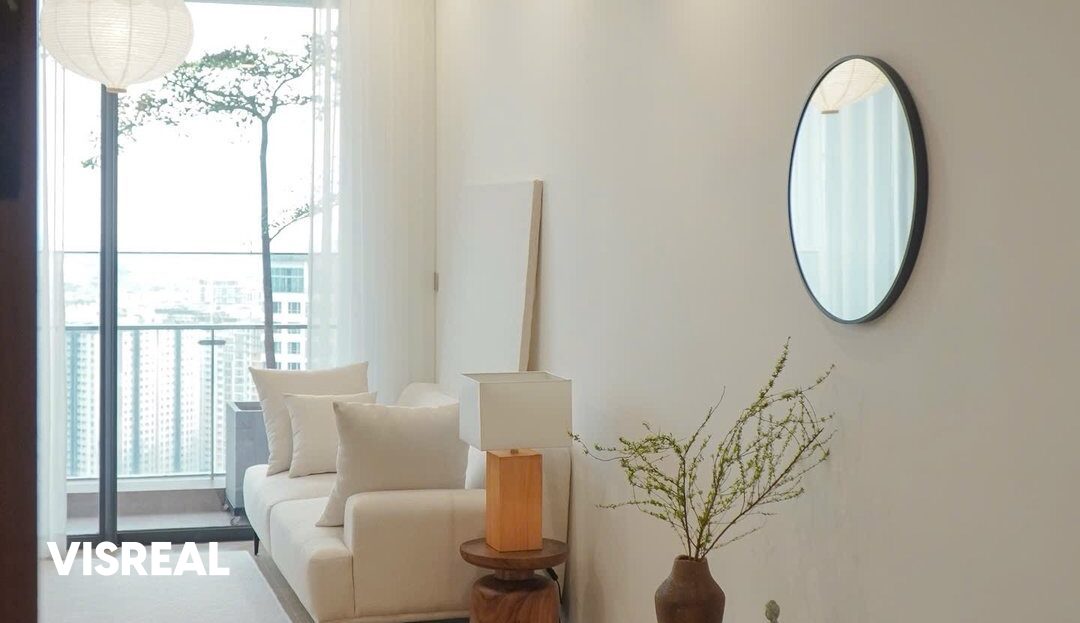 Cream sofa and round mirror by the balcony door, minimalist Lumiere Riverside apartment