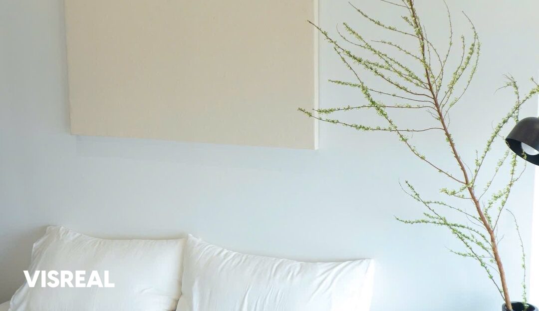 Bed with white linen and wooden side table, minimalist bedroom in Lumiere Riverside