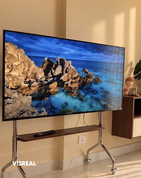 TV on a rolling stand over marble-look floor, 1-bedroom Vinhomes Central Park rental