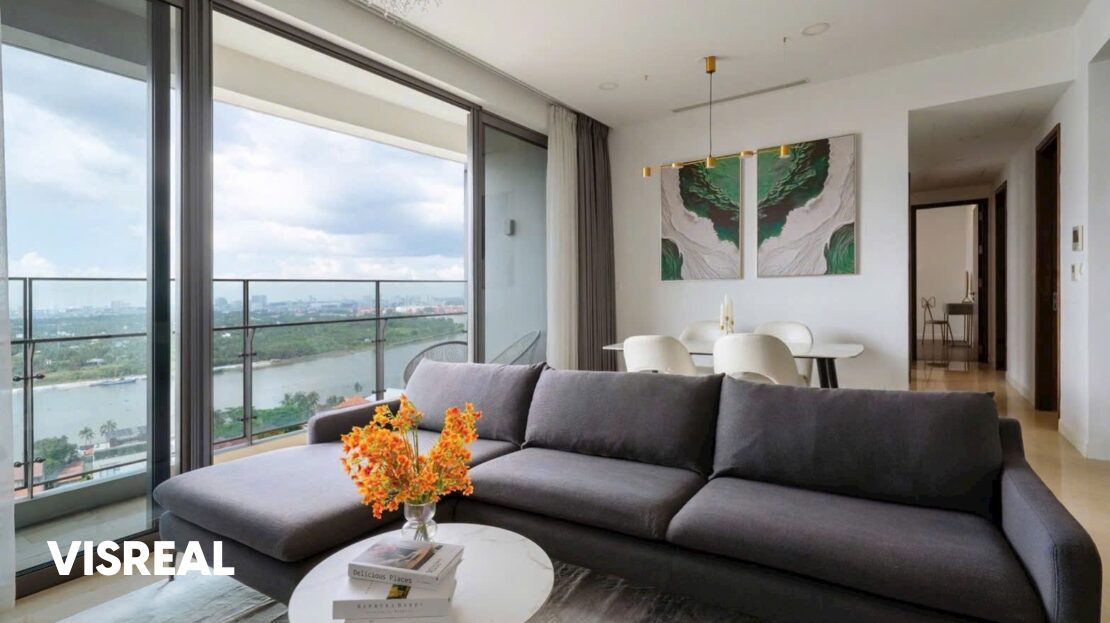 Living room with charcoal sofa and balcony doors facing the Saigon River, The Nassim 3BR