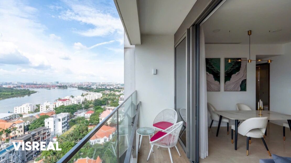 Balcony with glass railing and two chairs over Thao Dien villas, The Nassim 3-bedroom