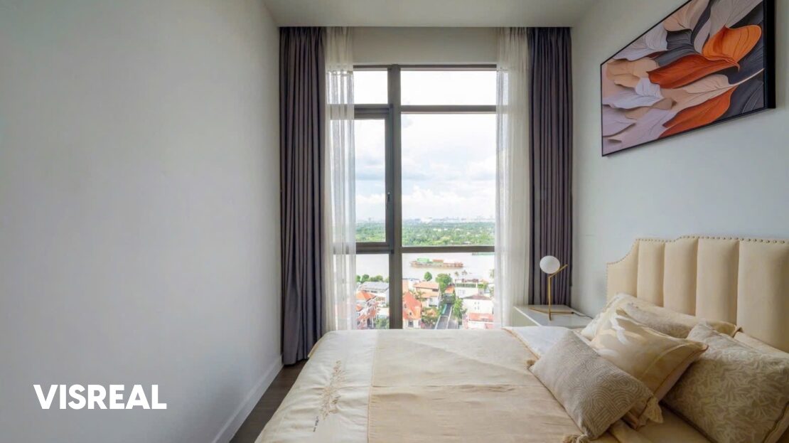 Second bedroom with cream padded headboard and window over the river, The Nassim
