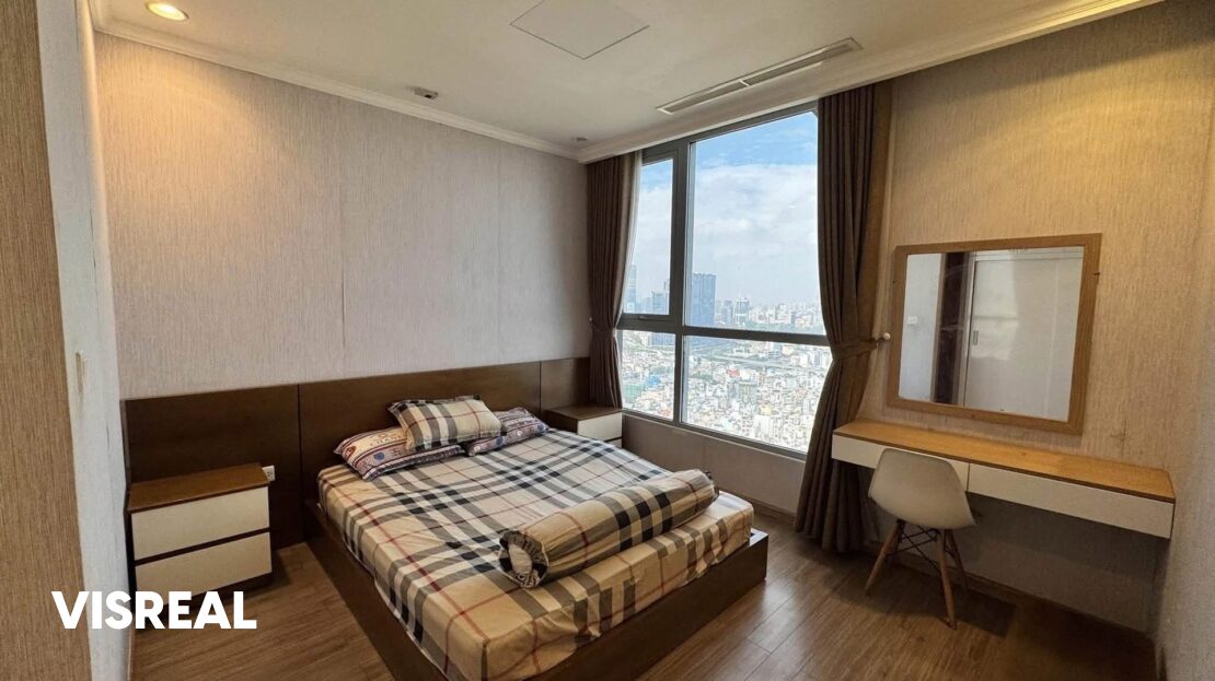 Master bedroom with dressing table and window over the city, Vinhomes Central Park 2BR