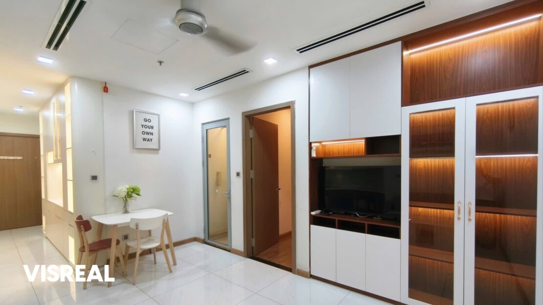 Entry hall with storage cabinets, dining nook and bedroom door, Vinhomes Central Park 1BR