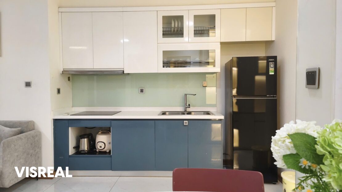 Kitchen run with range hood, double sink and two-door fridge, Vinhomes Central Park 1BR rental
