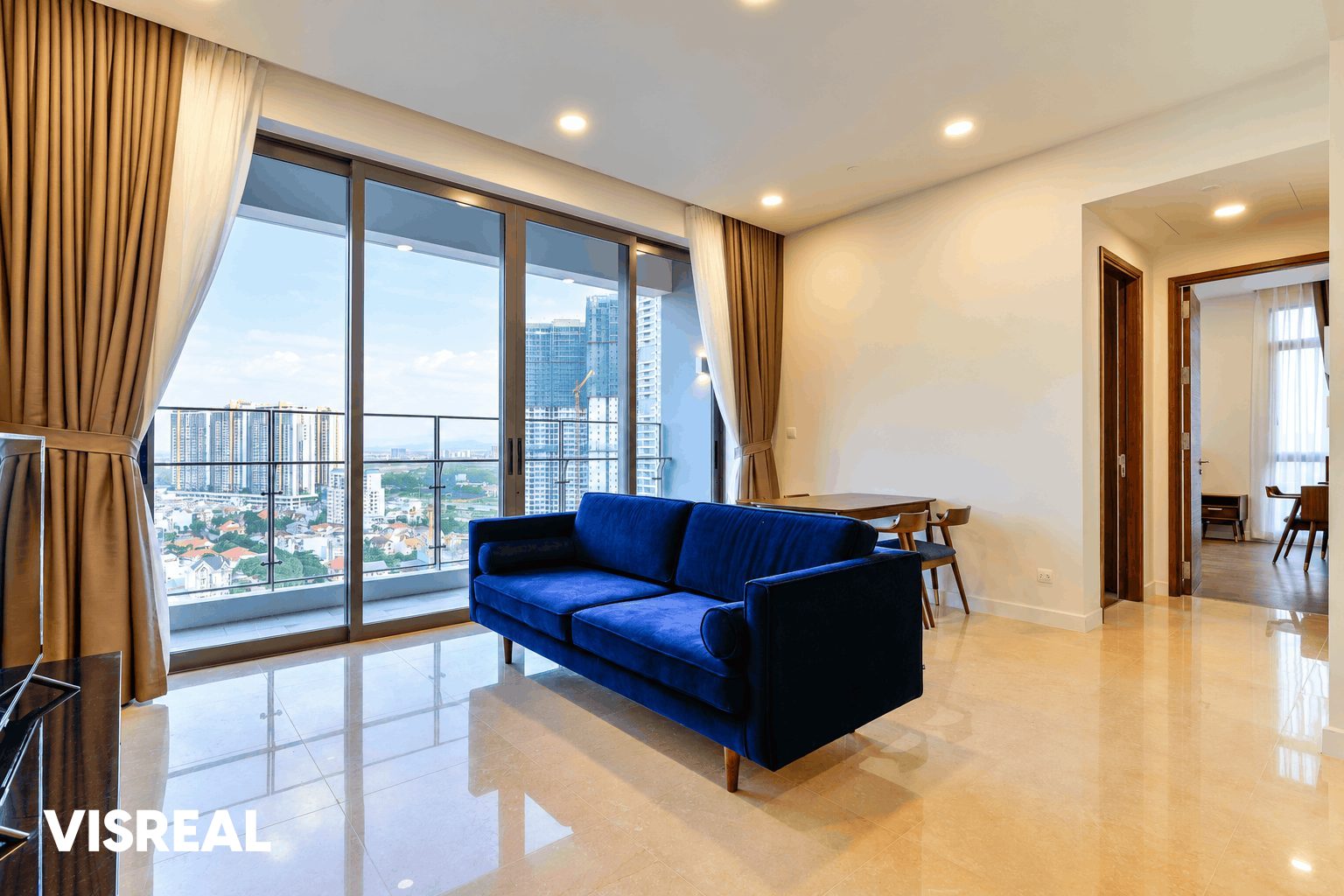High-floor living room at Nassim Thao Dien looking over the low-rise streets of Thao Dien