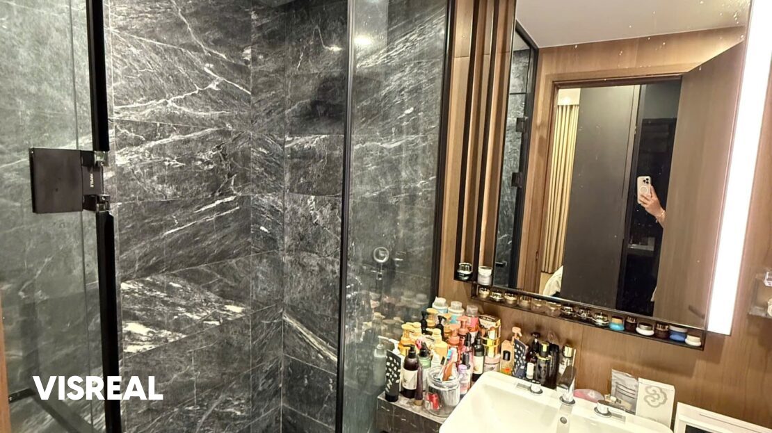 Bathroom with rain shower and lit vanity mirror, Lumiere Riverside 2BR